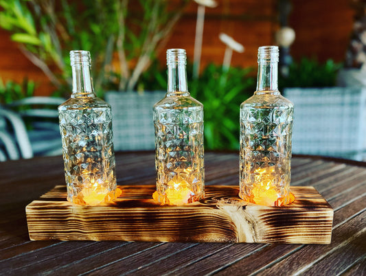 Tischleuchter dreiflammig mit alten Three Sixty Vodka Flaschen - Glas auf Holz - besonderes Unikat auf Kantholz - Auftragsarbeit