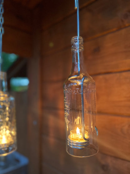 Windlicht aus Captain Morgan Flasche - ein Flaschenjunge (zum Anhängen) mit Glasrelief - besonderes Unikat mit Drahteinsatz