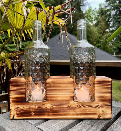 Tischleuchter aus Three Sixty Vodka Flaschen auf Kantholz