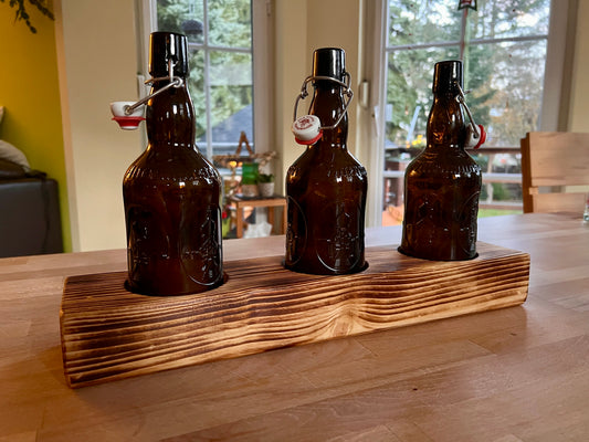 Tischleuchter dreiflammig mit Altenmünster Bügelflaschen - Glas auf Holz - besonderes Unikat auf Kantholz - Auftragsarbeit